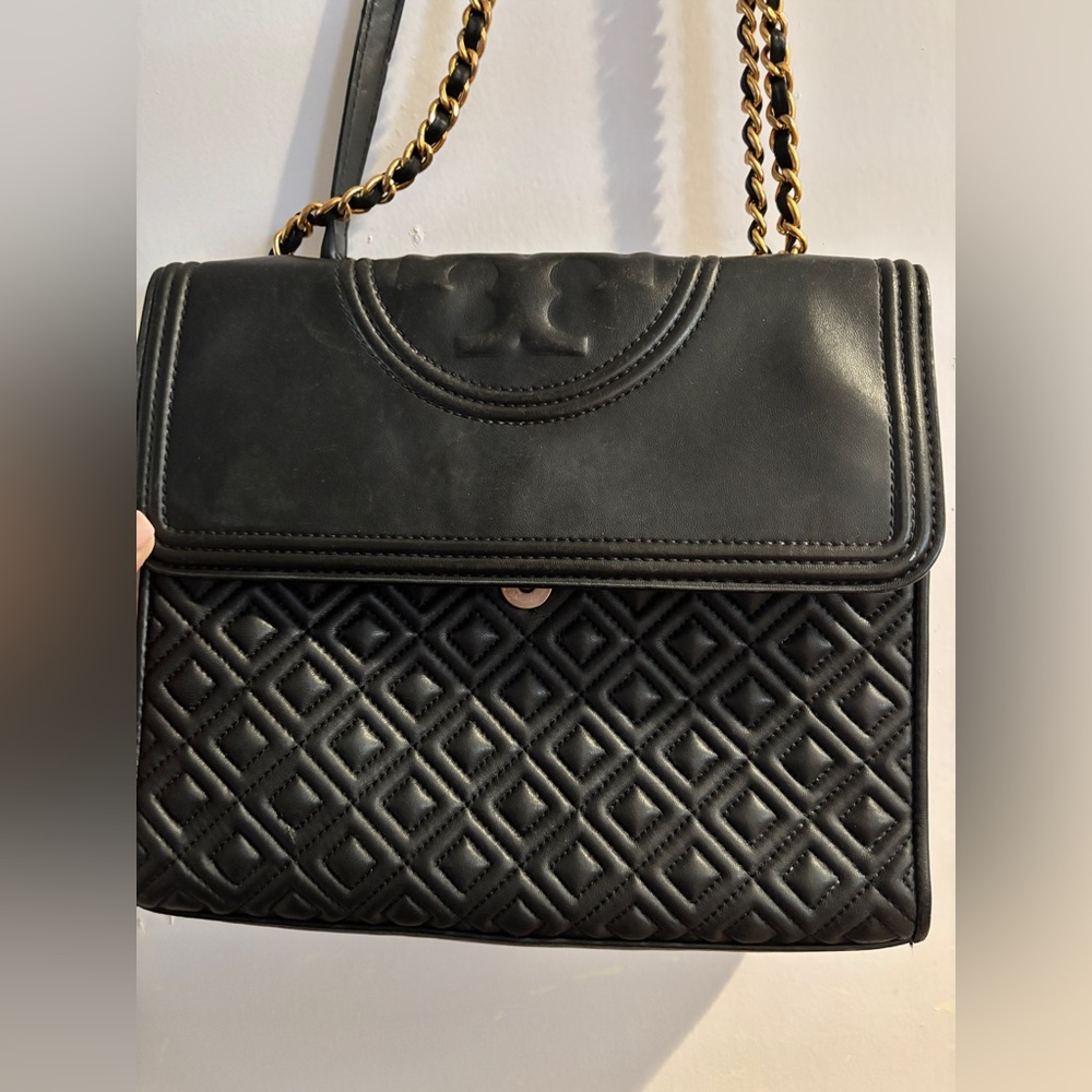 Tory Burch Black Leather Flemming convertible bag.
